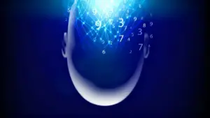 Sagoma stilizzata di una testa con numeri e connessioni luminose che fluttuano sopra